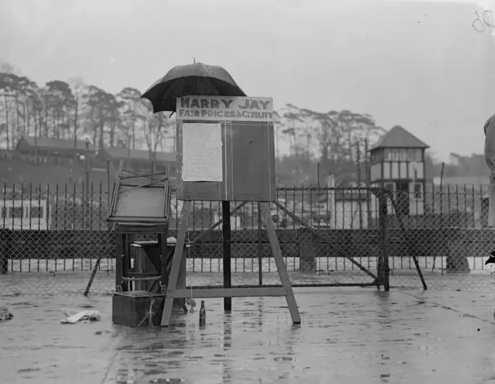 Framed Print : Brooklands meeting postponed through rain. Heavy rain caused disappointment to Framed Print : Brooklands meeting postponed through rain. Heavy rain caused disappointment to
