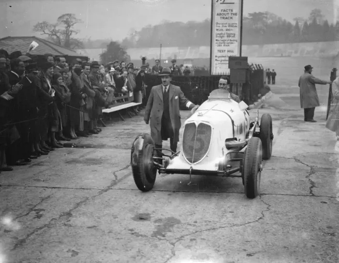 Framed Print : Brooklands races. Photo shows; Mr Whitney Straight driving his car back from the track Framed Print : Brooklands races. Photo shows; Mr Whitney Straight driving his car back from the track