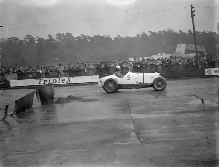 Framed Print : Brooklands races. Photo shows; Mr Whitney Straight speeding down the track. 28