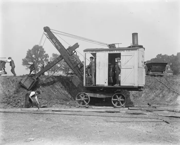 Framed Print : Building a concrete village at Braintree, Essex The steam shovel, which has been