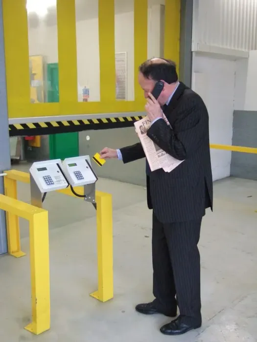 Framed Print : Business man entering a building using a swipe card. ?TopFoto Framed Print : Business man entering a building using a swipe card. ?TopFoto