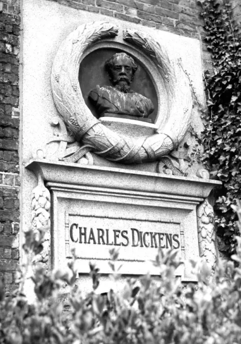 Framed Print : A bust of Charles Dickens on the side of Bleak House which was once his home. Broadstairs