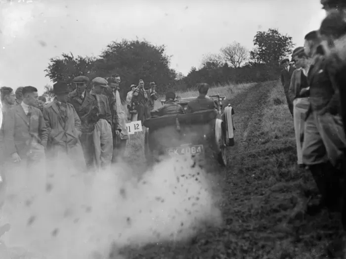 Framed Print : A car struggling up the track during a hillclimb event. 1935