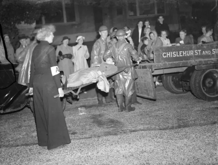 Framed Print : Casualties are being loaded into the back of a lorry during an air raid drill