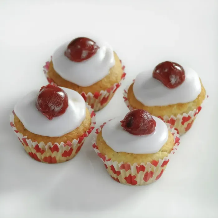 Framed Print : Cherry topped mini muffins on white background credit: Marie-Louise Avery / thePictureKitchen Framed Print : Cherry topped mini muffins on white background credit: Marie-Louise Avery / thePictureKitchen