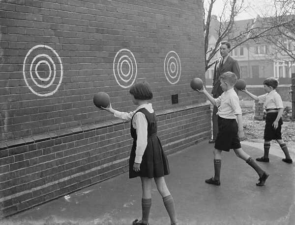 Children play wall ball games at St Mary Cray Council School in Bromley, Kent. 1939
