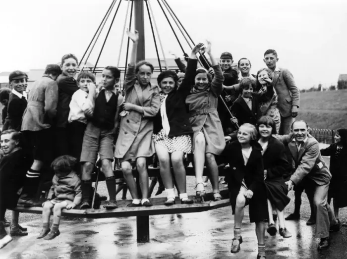 Framed Print : The childrens playground roundabout, a popular place for children after school Framed Print : The childrens playground roundabout, a popular place for children after school