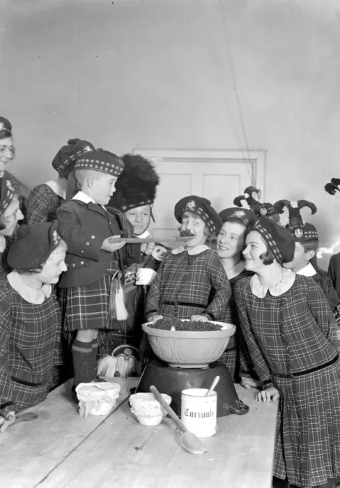 Framed Print : Christmas prepartations at the Royal Caledonian Schools, Bushey. Tasting pudding Framed Print : Christmas prepartations at the Royal Caledonian Schools, Bushey. Tasting pudding
