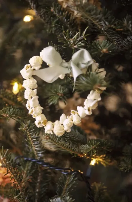 Framed Print : Christmas tree decoration of popped corn threaded in heart shape credit: Marie-Louise Framed Print : Christmas tree decoration of popped corn threaded in heart shape credit: Marie-Louise