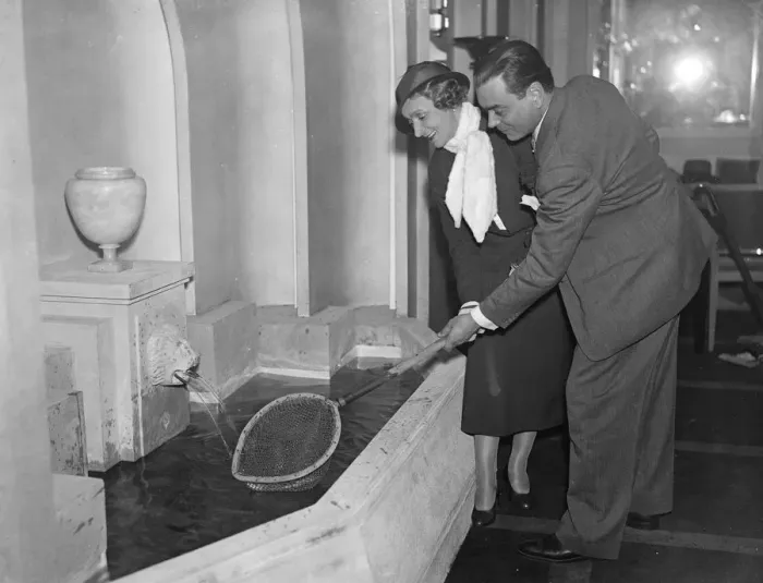 Framed Print : Ciros Club reopens with fishing pond for customers to catch own fish and see it prepared Framed Print : Ciros Club reopens with fishing pond for customers to catch own fish and see it prepared