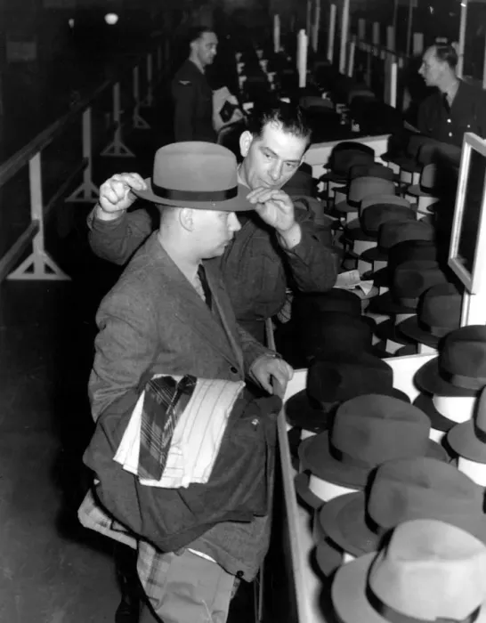 Framed Print : Back to civvy street : discharged British airmen select their civilian clothes