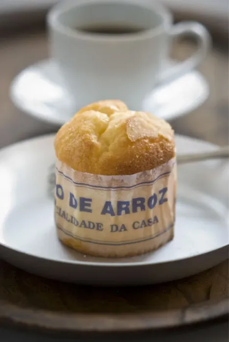 Framed Print : Classic Portuguese muffin type cake made with rice in paper wrapper on metal plate Framed Print : Classic Portuguese muffin type cake made with rice in paper wrapper on metal plate