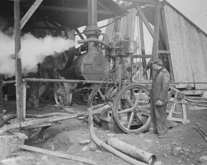 Framed Print : Coal from war wrecked coalfield of Lens. A small section of one of the pumps