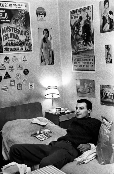Framed Print : A colonial relaxes in his bed sitter in Earls Court London. This is a room in Nevern Rd Framed Print : A colonial relaxes in his bed sitter in Earls Court London. This is a room in Nevern Rd