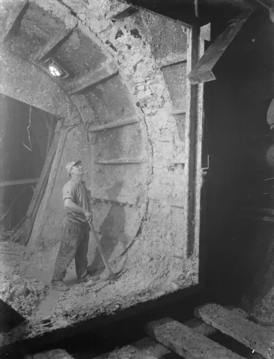 Framed Print : The completion of the pilot Dartford Tunnel. Miner, Joe Moon, works around Framed Print : The completion of the pilot Dartford Tunnel. Miner, Joe Moon, works around