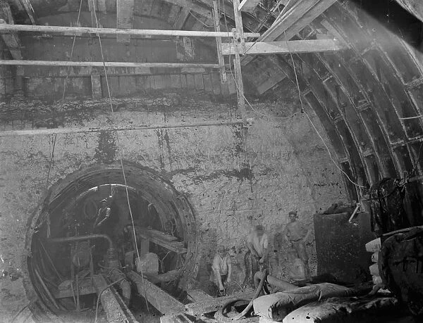 The construction of the Dartford Tunnel. Workers building the main tunneling shield