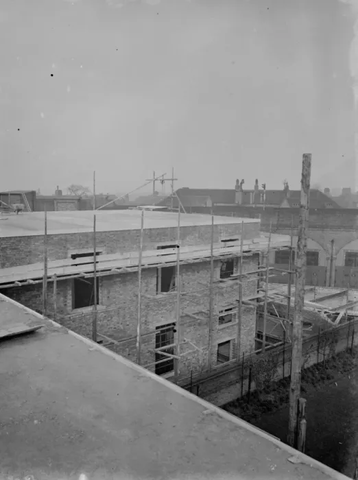 Framed Print : The construction of the Speedwell Telephone Exchange at Golders Green, London - rooftop view Framed Print : The construction of the Speedwell Telephone Exchange at Golders Green, London - rooftop view