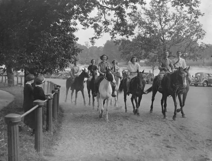 Framed Print : Cool costume in the Row. In corn silk shirts, riders in Rotten Row pass from