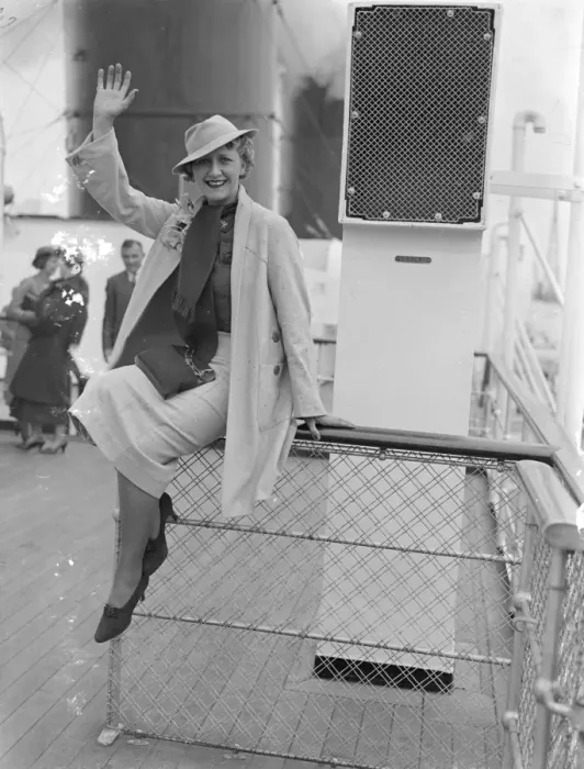 Framed Print : Cora Goffin, the well - known British comedy actress, waves to the camera onboard ship Framed Print : Cora Goffin, the well - known British comedy actress, waves to the camera onboard ship