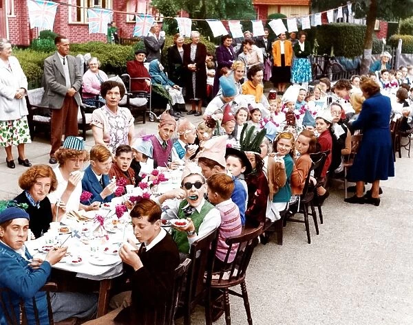 Coronation - children having a street party to celebrate. Norfolk Crescent, Sidcup photographer