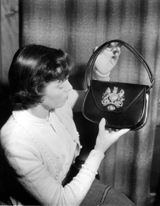 Framed Print : Coronation Souvenir Mrs A Taylor holding a black handbag with coat of arms and Royal Framed Print : Coronation Souvenir Mrs A Taylor holding a black handbag with coat of arms and Royal