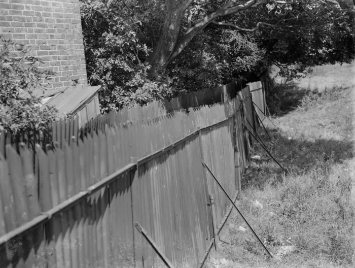 Framed Print : Corrugated iron fence at Darenth, Kent. 1935 Framed Print : Corrugated iron fence at Darenth, Kent. 1935