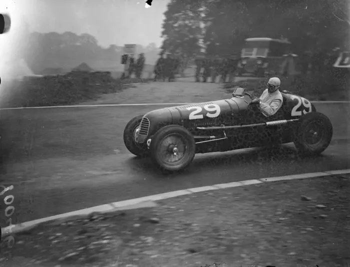 Framed Print : Count Trossi speeding round the track in his Maserati. Famous British and continental Framed Print : Count Trossi speeding round the track in his Maserati. Famous British and continental
