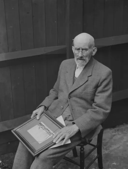 Framed Print : Crayford old man sitting with a picture. 1935 Framed Print : Crayford old man sitting with a picture. 1935