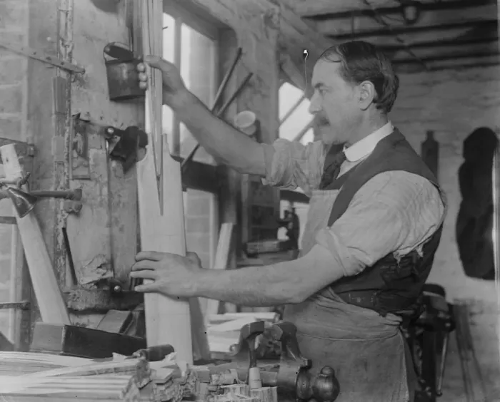 Framed Print : Cricket Bat Making at John Wisdens Placing the handle into the blade 23 March 1920 Framed Print : Cricket Bat Making at John Wisdens Placing the handle into the blade 23 March 1920