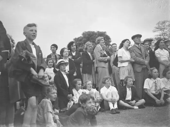 Framed Print : The crowd watching a trapeze artist performing at the Sidcup fete in Kent Framed Print : The crowd watching a trapeze artist performing at the Sidcup fete in Kent