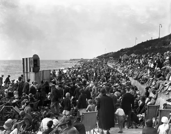 Framed Print : Crowds watch a Punch and Judy show on the beach at Clacton - on - Sea, Essex. 24 Framed Print : Crowds watch a Punch and Judy show on the beach at Clacton - on - Sea, Essex. 24