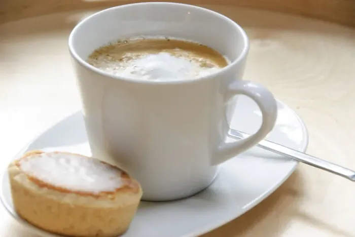 Framed Print : Cup of cappuccino with mazarin, almond tart credit: Marie-Louise Avery / thePictureKitchen Framed Print : Cup of cappuccino with mazarin, almond tart credit: Marie-Louise Avery / thePictureKitchen