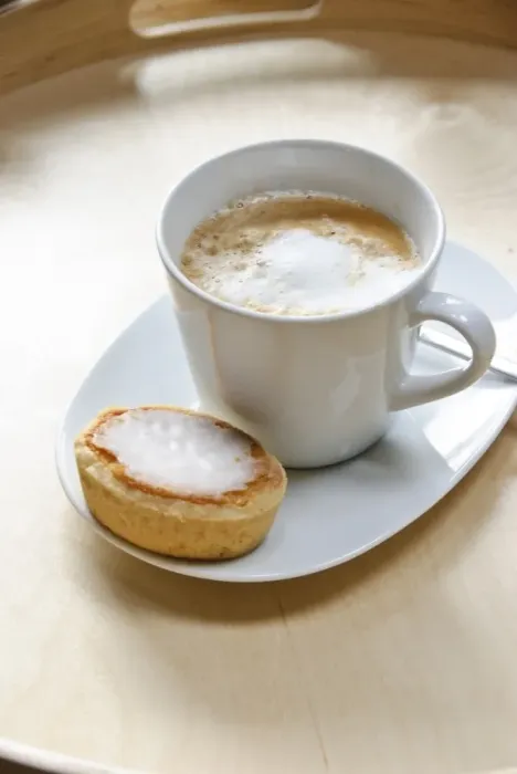 Framed Print : Cup of cappuccino with spiral of cocoa dusted on top with a mazarin - Swedish almond Framed Print : Cup of cappuccino with spiral of cocoa dusted on top with a mazarin - Swedish almond