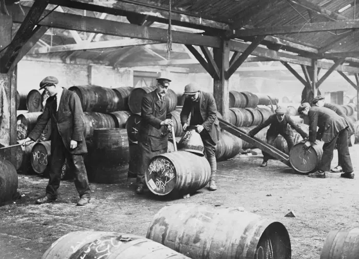 Framed Print : Customs workers at a bonded warehouse in London, England. undated