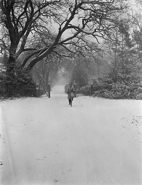 Cycling through the snow in Chislehurst. 26 December 1938