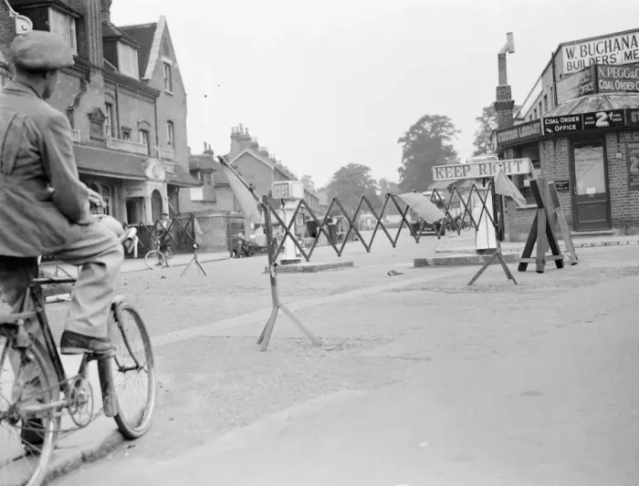 Framed Print : A cyclist negotiates a road barricade for road works in Bromley, Kent