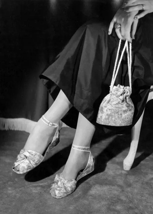 Framed Print : Dance sandals for Christmas parties are made in exquisite pastel brocades, and black or white Framed Print : Dance sandals for Christmas parties are made in exquisite pastel brocades, and black or white