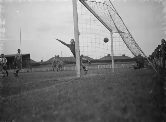 Framed Print : Dartford football club hold a pre season match. A goal is scored Framed Print : Dartford football club hold a pre season match. A goal is scored