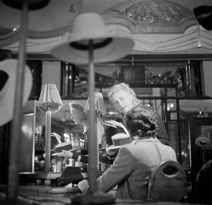 Framed Print : Day in the life of a Midinette. A Parisian salesgirl selling hats. 1930s Framed Print : Day in the life of a Midinette. A Parisian salesgirl selling hats. 1930s