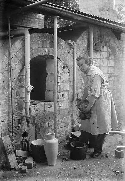 Distinguished artist potter who has his studio and kiln in London garden. Beautiful