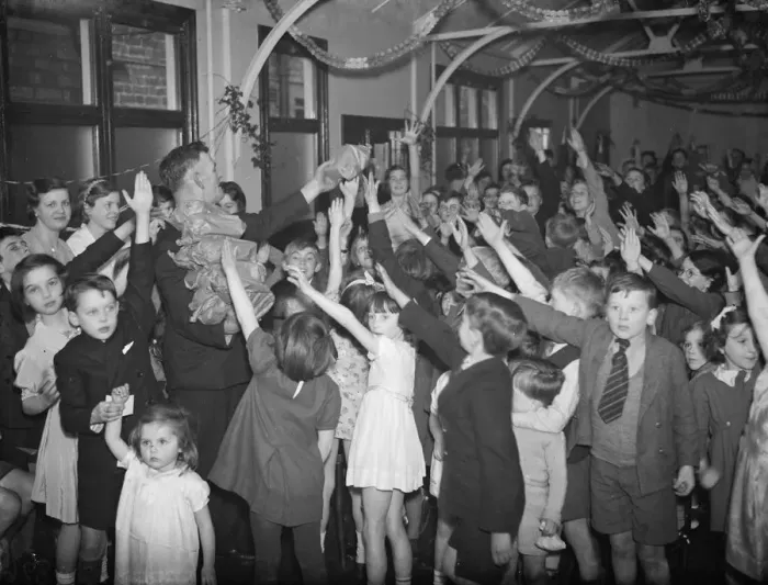 Framed Print : Distribution of presents at a childrens party at the Station Hotel, Sidcup, Kent Framed Print : Distribution of presents at a childrens party at the Station Hotel, Sidcup, Kent