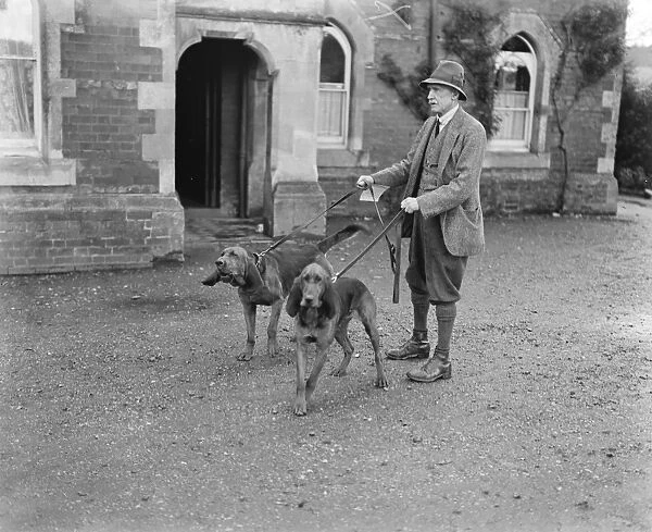 Dog detectives. Man hunting trials at Savernake. Colonel Johnson with his bloodhounds