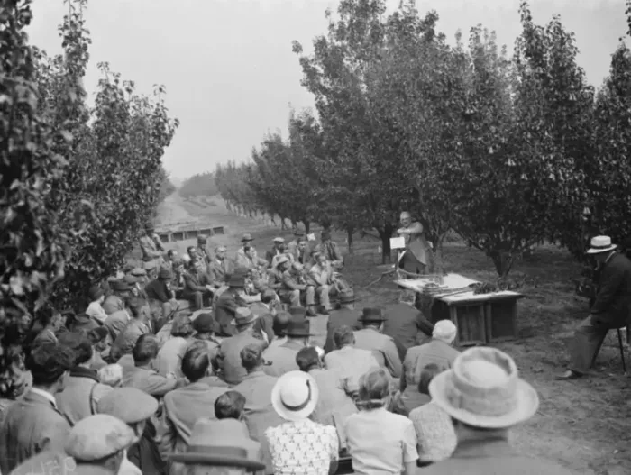 Framed Print : Dr Hatton holding an open air lecture at the East Malling Research Station open day Framed Print : Dr Hatton holding an open air lecture at the East Malling Research Station open day