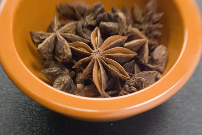 Framed Print : Dried Star anise fruits in small bowl. Also known as star aniseed, badiane or Chinese Framed Print : Dried Star anise fruits in small bowl. Also known as star aniseed, badiane or Chinese