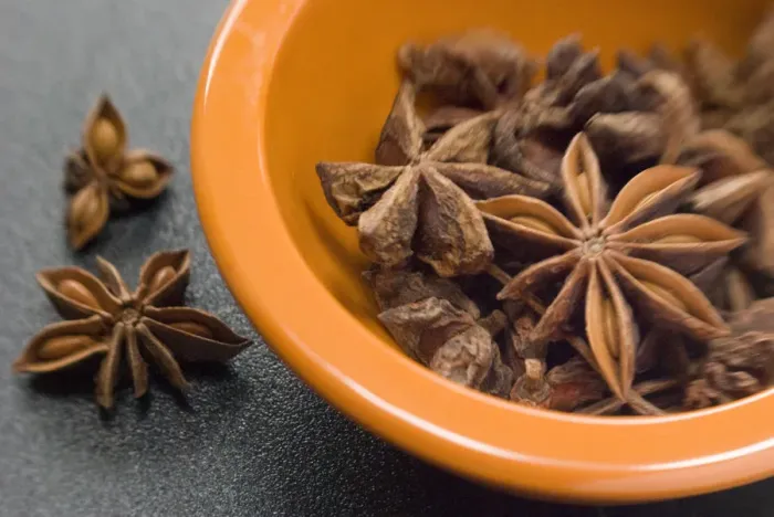Framed Print : Dried Star anise fruits in small bowl. Also known as star aniseed, badiane or Chinese Framed Print : Dried Star anise fruits in small bowl. Also known as star aniseed, badiane or Chinese