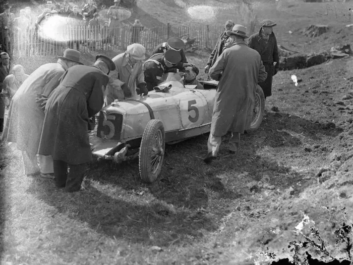Framed Print : Driver escapes in 100 miles an hour crash at British Empire trophy races. Wel Handley Framed Print : Driver escapes in 100 miles an hour crash at British Empire trophy races. Wel Handley