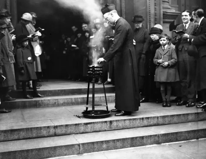 Framed Print : An Easter custom at Westminster Cathedral. Lighting the holy fire. 10 April 1925 Framed Print : An Easter custom at Westminster Cathedral. Lighting the holy fire. 10 April 1925
