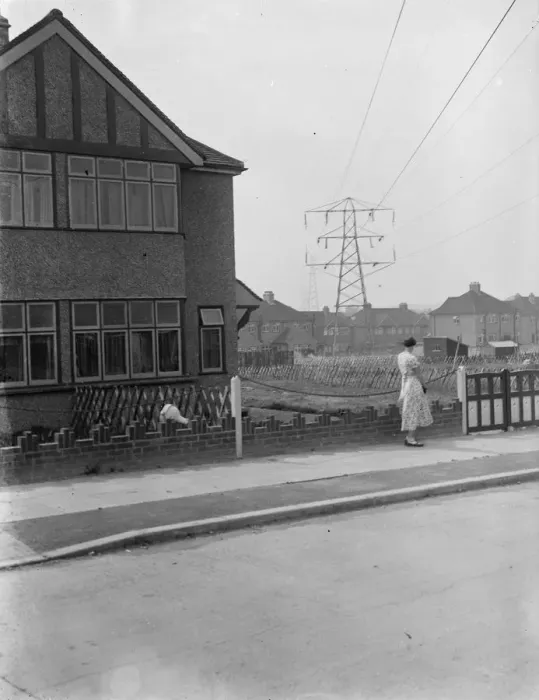 Framed Print : Electricity pylon viewed from the houses. 1937 Framed Print : Electricity pylon viewed from the houses. 1937