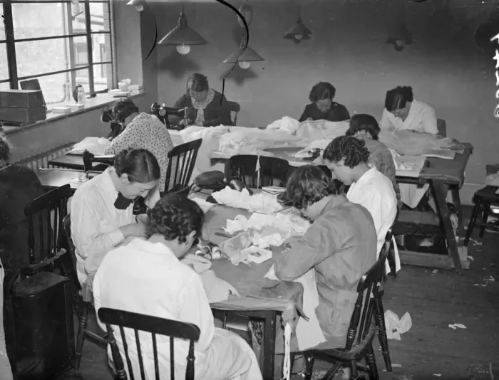 Framed Print : Embroiders at Hartnells, the Court dressmakers, are at work in London on exquisite Framed Print : Embroiders at Hartnells, the Court dressmakers, are at work in London on exquisite