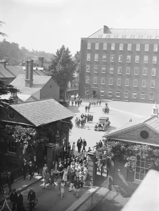 Framed Print : Employees leaving the works of Messrs Heathcoat and Co at Tiverton. 15 July 1929 Framed Print : Employees leaving the works of Messrs Heathcoat and Co at Tiverton. 15 July 1929